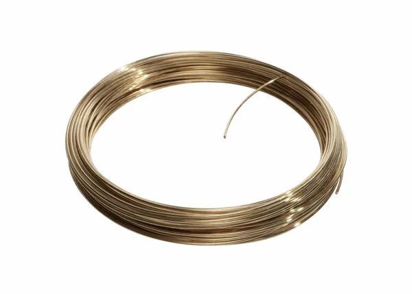 A neatly coiled roll of Harris 38T550 Safety-Silv® 38T high silver brazing alloy, 3/32 in., is cadmium-free and features a shiny, golden appearance with one end protruding from the smooth circular loop on a white background.