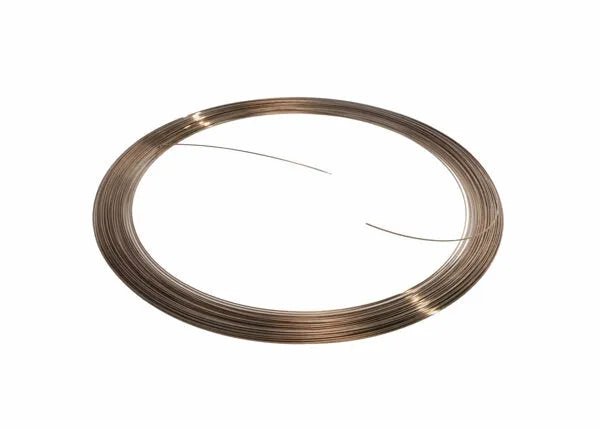 A single coil of Harris 4515 - Safety-Silv 45 Silver Brazing Alloy, cadmium-free and 1/32 in (0.8 mm) thick, is neatly arranged on a white background with both ends slightly protruding from the shiny wire.