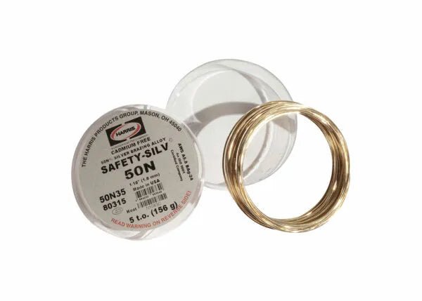 A neatly coiled Harris 50N35 Safety-Silv 50N silver brazing alloy (1/16 in, 5 troy oz cup) sits by its clear round case, ready for precision work with high-quality silver filler metal.