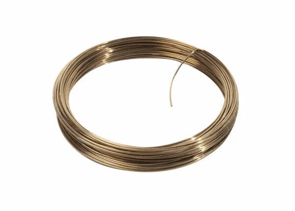 A coiled loop of Harris 50N550 Safety-Silv 50N Silver Brazing Alloy, 3/32 in (2.4 mm), is neatly wound with one end extended outward and rests on a plain white background.