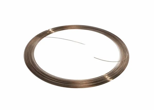 A Harris 5615 Safety-Silv 56 Silver Brazing Alloy wire (1/32 in, 5 toz coil) forms a flat circular loop with one end loose, displayed on a white background; the metallic wire is cadmium-free.