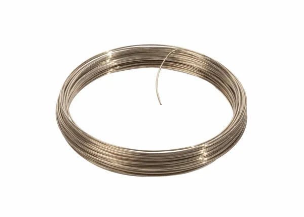 A coil of Harris 56550 Safety-Silv 56 Silver Brazing Alloy, 3/32 in (2.4 mm), cadmium-free, is wound neatly with a loose end extending outward. The silvery wire has a shiny, reflective finish and is displayed against a white background.