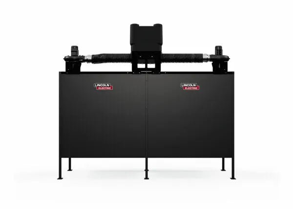 Front view of the Lincoln Double Weld Booth Fume Extraction One-Pak 6x6 ft. (K5563-4), a large black unit with two Lincoln Electric logos, pipes and components on top, supported by four legs, designed for efficient fume extraction in weld booths.