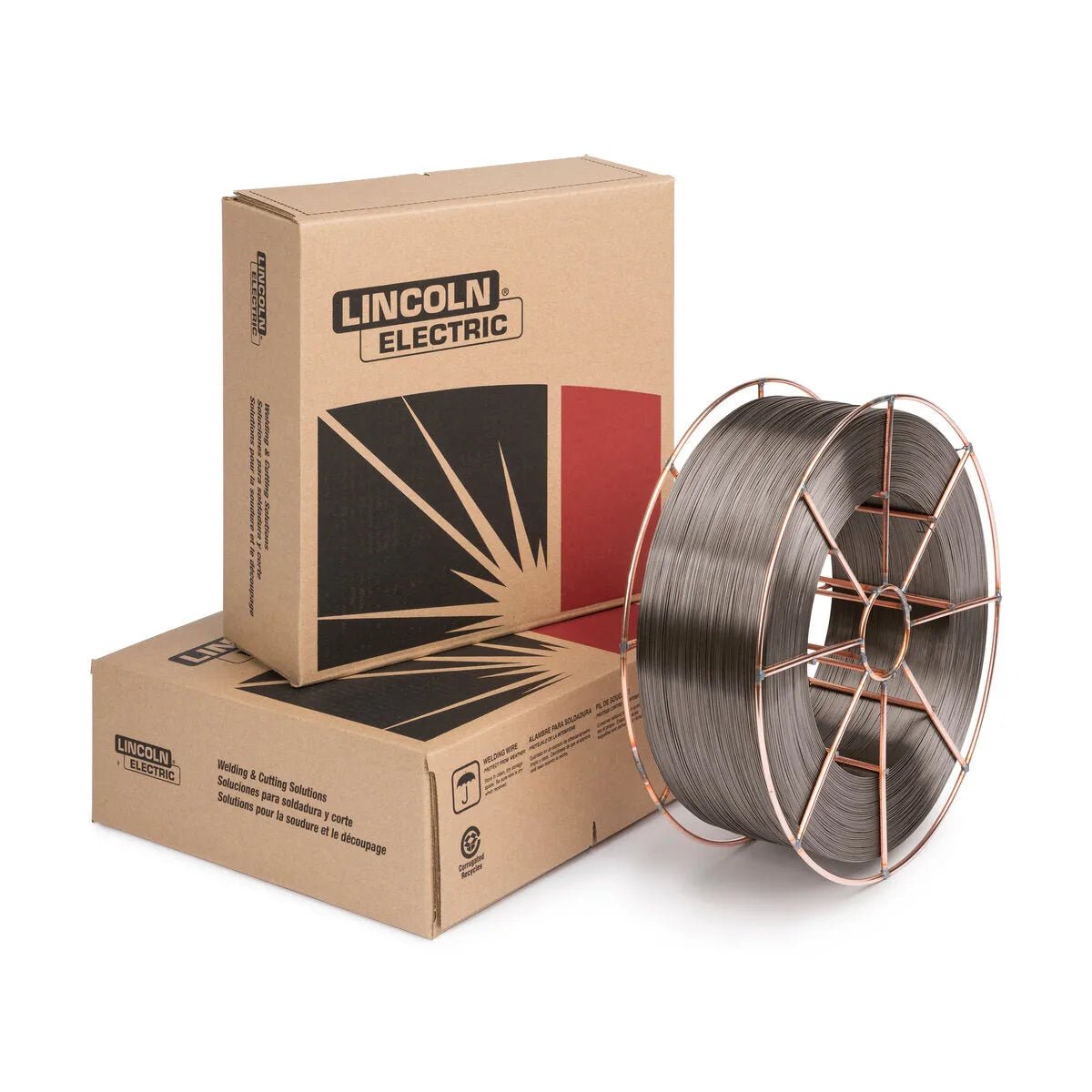 A large spool of Metalshield MC-6 metal-cored welding wire for GMAW-C sits beside two stacked Lincoln Electric boxes with graphic design on the front, all set against a white background.