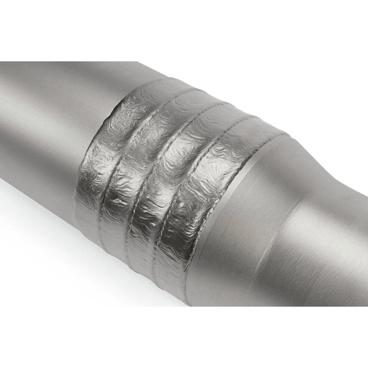 Close-up of welded pipe joint using Lincoln ED037920 Guardian CF welding wire, highlighting quality welds and casing protection.
