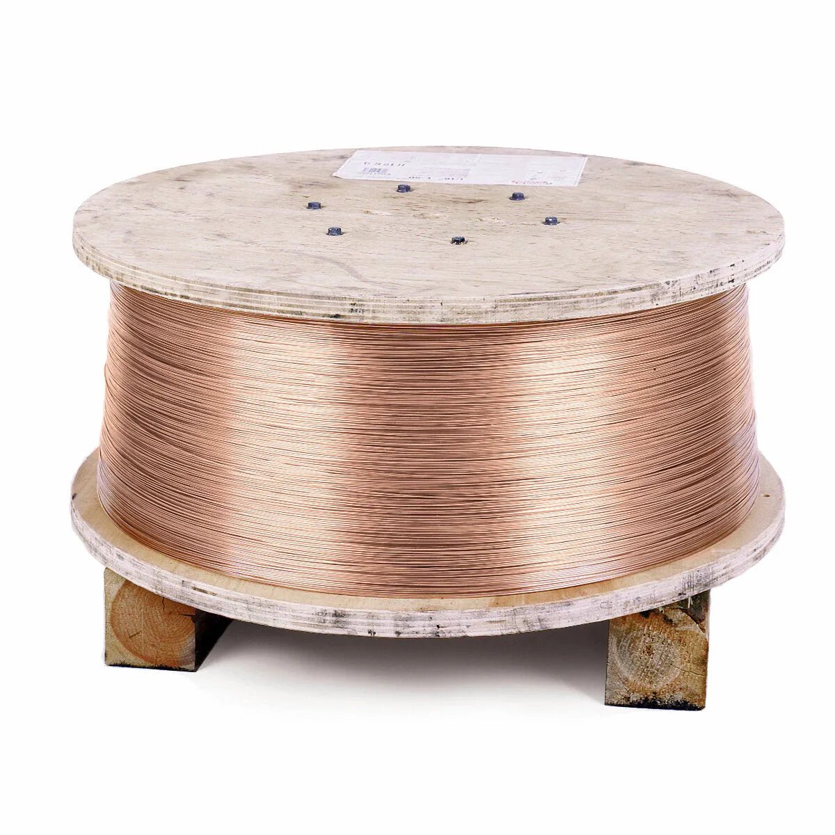 A 750 lb Speed Feed Reel of Lincoln EDS11809 Lincolnweld L-61 Submerged Arc SAW Welding Wire, 1/8 in, sits on wooden blocks with a paper label. The copper-coated wire has a shiny, reddish-brown metallic finish.