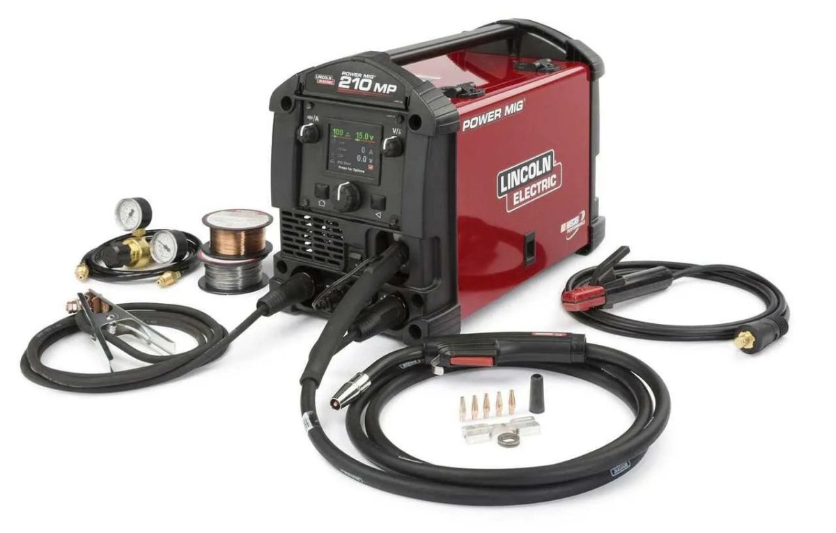 Lincoln Electric Power Mig 210 MP Multi-Process Welder with display, cables, torch, wire spool, gas regulators & accessories.
