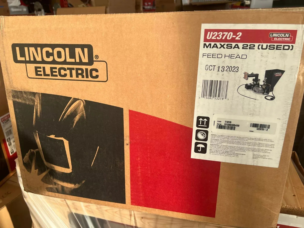 Lincoln Electric MAXsa 22 Feed Head U2370-2 used welding equipment box, barcode, date, and product image for hard automation.