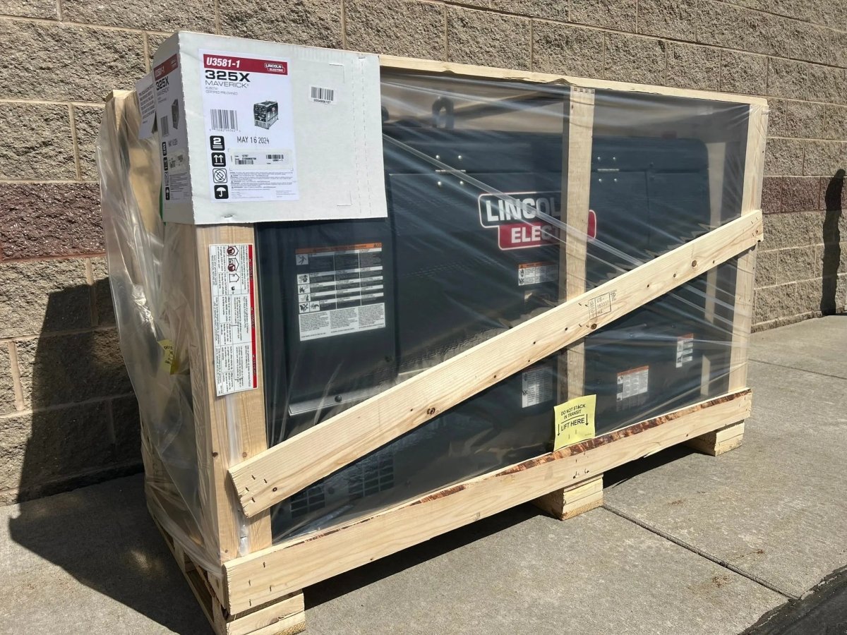 Lincoln Maverick 325X engine-driven welder Kubota U3581-1, packaged on pallet with box, ready for setup at WeldingMart.