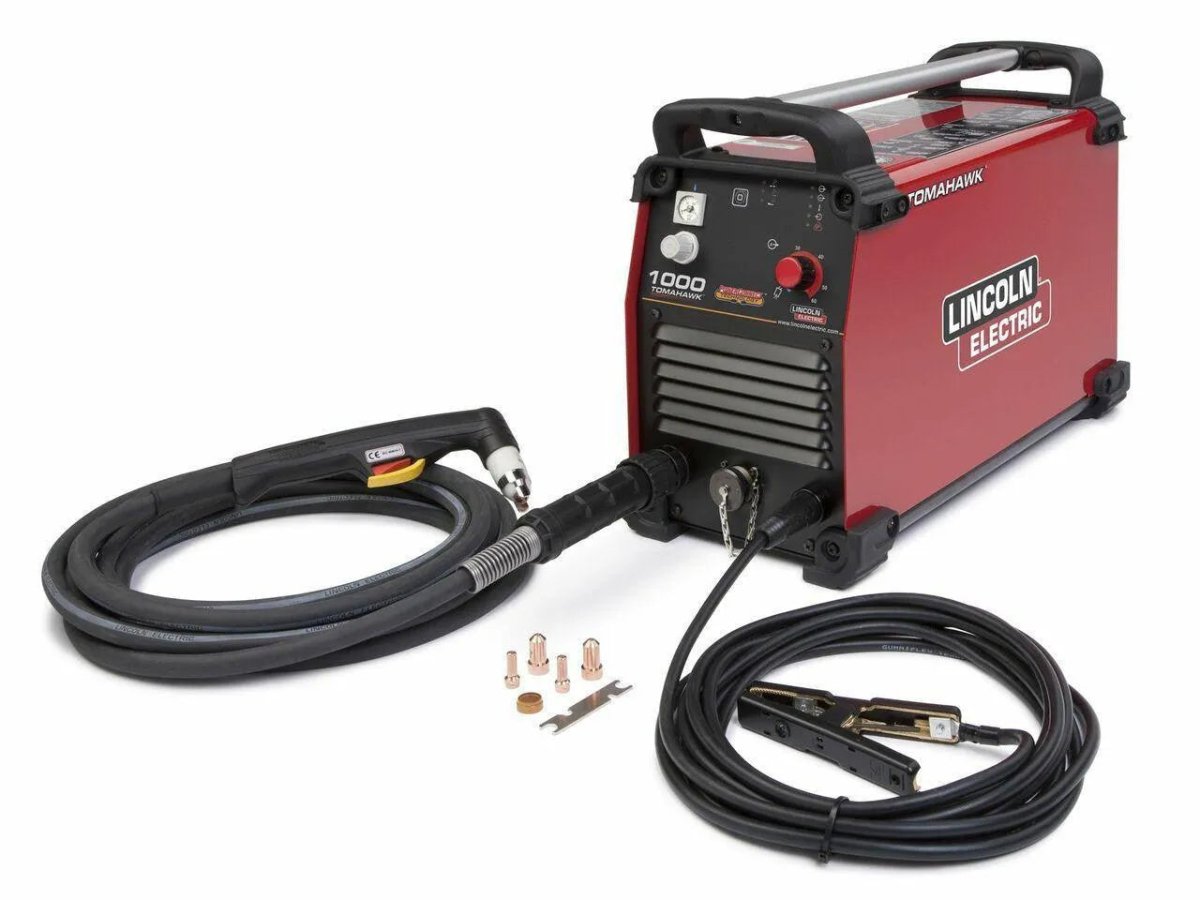 Lincoln Tomahawk 1000 Plasma Cutter with hand torch, cables, ground clamp, and welding accessories on white—WeldingMart equipment.