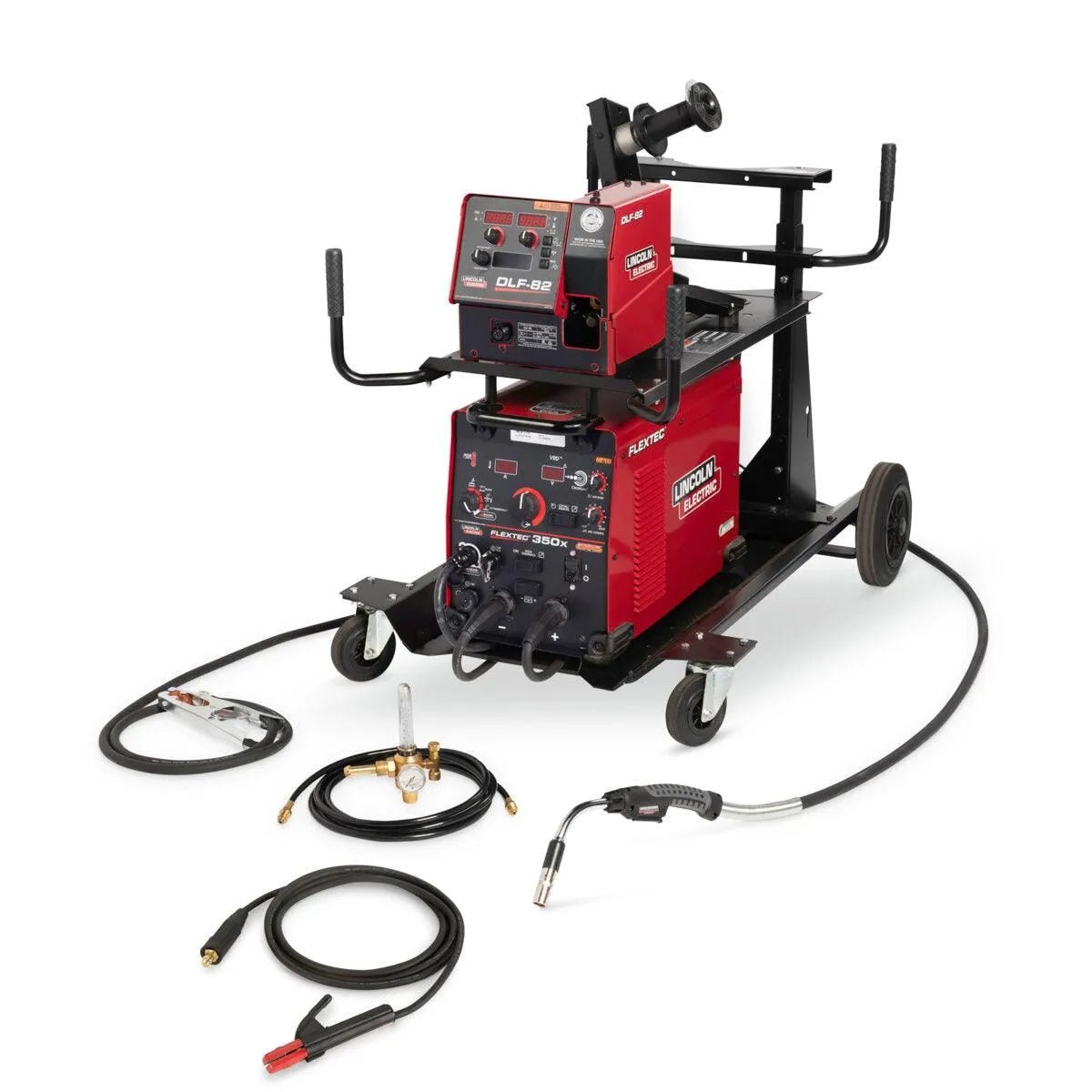 A Lincoln Flextec 350X PowerConnect DLF-82 Education Ready-Pak (K5336-3) welding machine sits on a wheeled cart with control panels and cables, surrounded by hoses, torch, clamps, and a regulator arranged on the white floor.