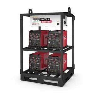 A black Lincoln FLEXTEC 350X Standard Compact 4-Pack Rack K3403-1 holds four red Flextec 350X welders, two per shelf. Each welders control panel is visible. The inverter rack includes lifting points and a branded white panel above.