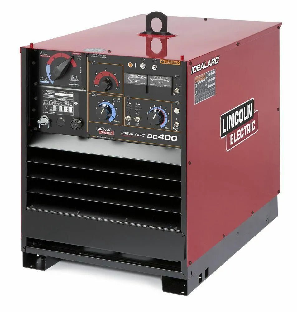 A red and black Lincoln IDEALARC DC-400 - K1308-25 industrial DC welder with multiple control knobs, switches, vents, and front panel meters is shown on a white background.