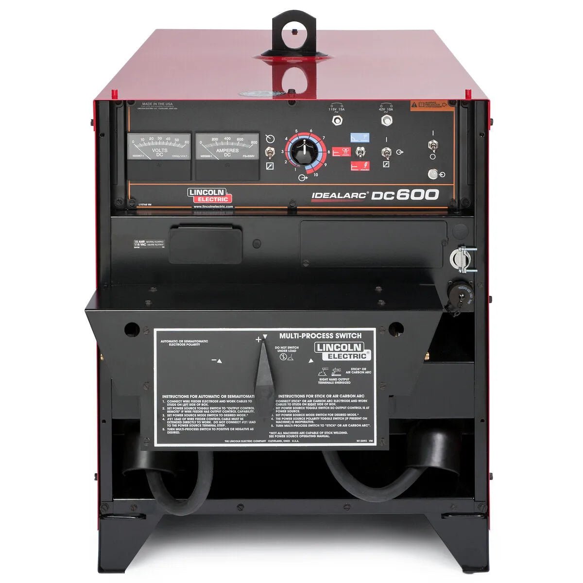 A front view of a red Lincoln Idealarc DC600 Multi-Process Welder with Multi-Process Switch (K1288-18). The control panel has analog gauges and switches. The lower open panel reveals wiring and an attached settings guide inside.