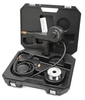 An open black plastic case with foam inserts securely holds a Lincoln Magnum 100SG Spool Gun (Air-Cooled, K2532-1), spool of wire, black cable, and instruction manual in fitted compartments.