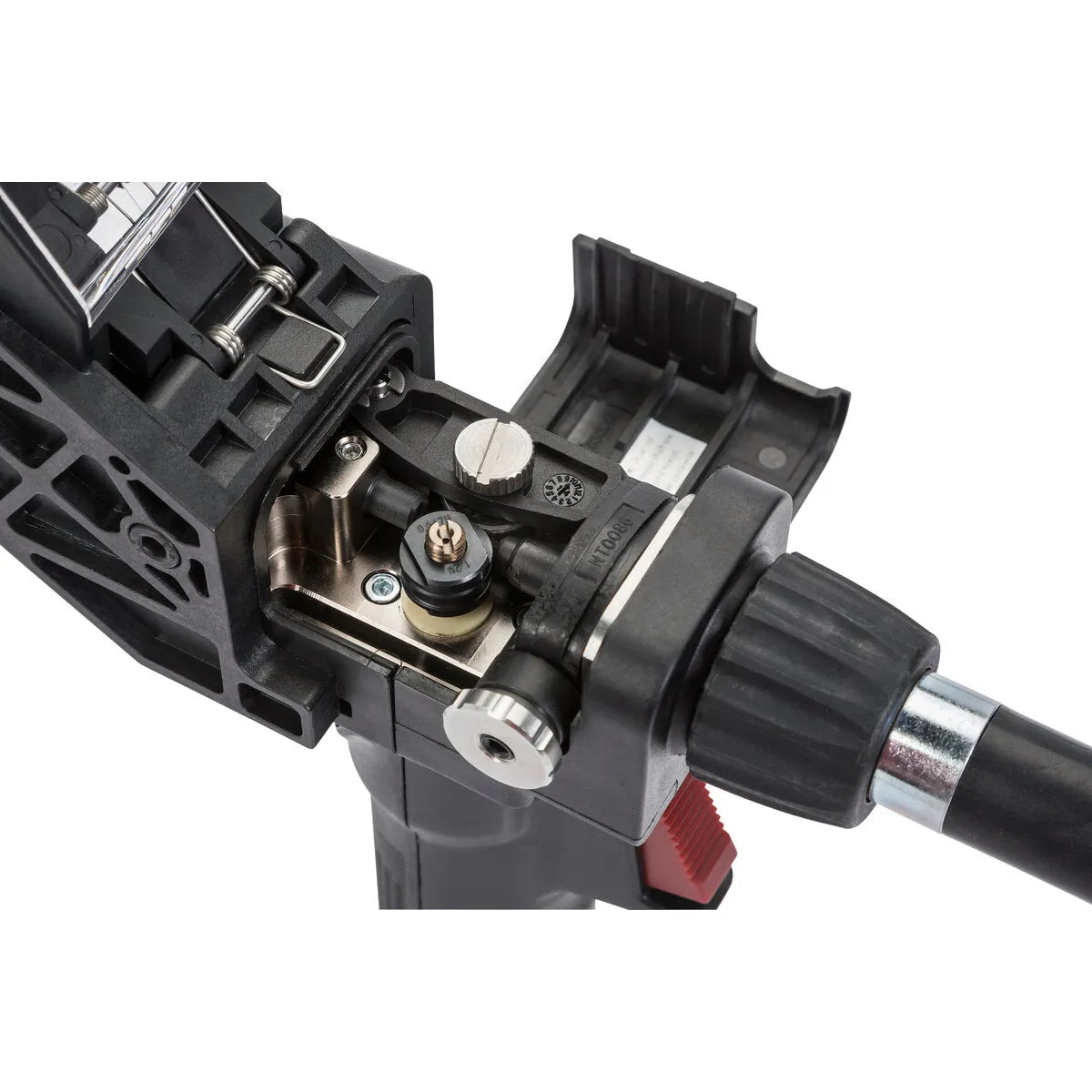 Close-up of the Lincoln Magnum PRO 250LX GT Spool Gun 25 ft K3569-2, highlighting its black housing, red trigger, silver textured dial, and exposed internal metal components with detailed parts and screws.