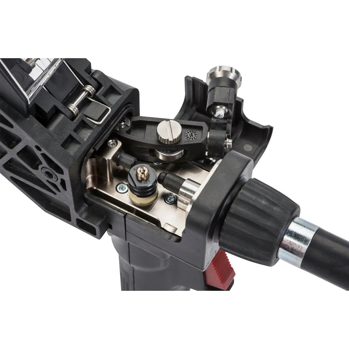 Close-up of the Lincoln Magnum PRO 250LX GT Spool Gun 25 ft K3569-2 shows its black plastic housing, textured handle, gears, rotating adjustment knob, cable attachment, and precision internal parts in a design similar to other Magnum PRO models.
