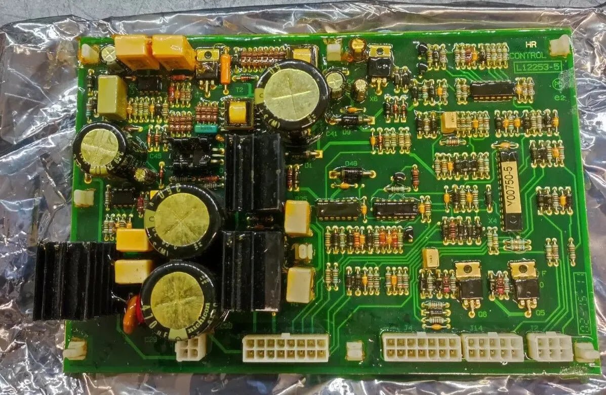 Lincoln OEM L12253-5 9SL12253-5 control PC board for welders, showing capacitors, resistors, and connectors on a green base.