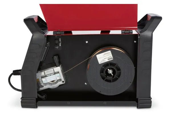 Lincoln Power MIG 215 MPi Welder open view shows internal spool, feed mechanism, red lid, black case—welding equipment at WeldingMart.