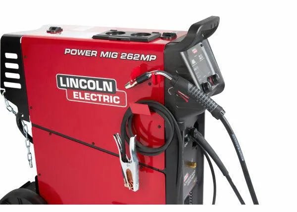 Lincoln Power MIG 262MP Multi-Process Welder in red with cables, control panel, and aluminum welding accessories at side angle.