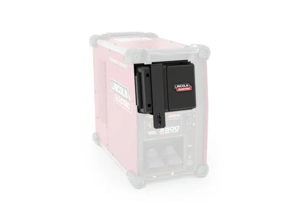 A black plastic Lincoln Power Wave Connectivity Hub K4884-1, featuring a red and white “Lincoln Electric” logo, is mounted on the side of a blurred red Lincoln Electric generator for seamless industrial welding system networking.