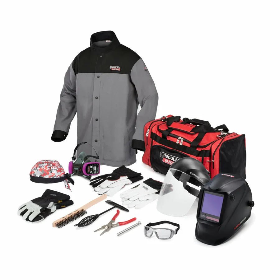 Lincoln Premium Welding Gear Ready-Pak L K3715-L: jacket, auto-darkening helmet, gloves, tools, safety gear, and duffel bag.
