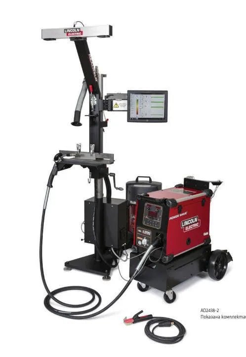 Lincoln REALWELD TRAINER AD2422-1 welding trainer with 6" fixture, control screen, cables, and Lincoln Electric branding.