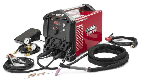 Lincoln SquareWave TIG 200 Welder with torch, ground clamp, cables, gauges, and connectors for precision TIG welding equipment.