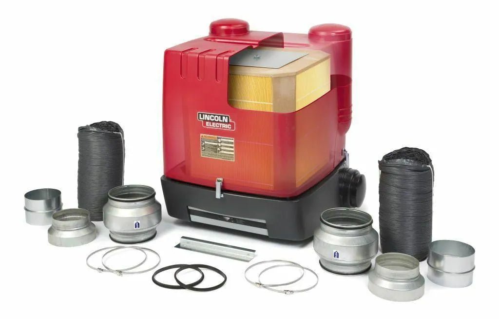 A Lincoln STATIFLEX 200-M DUAL ARM K1654-2 welding fume extractor, red and black with yellow accents, is centered amid vent adapters, black flexible hoses, clamps, gaskets, and a small silver metal bar on a white background.