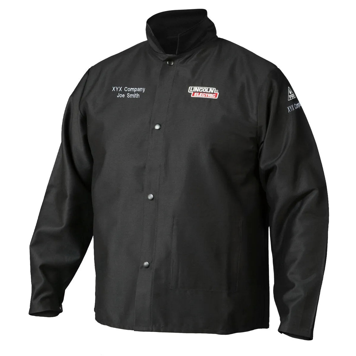 The Lincoln K2985-M Traditional FR Cloth Welding Jacket, size Medium, is made from black flame-retardant cotton with a snap-button front, stand-up collar, Lincoln Electric logo, and custom “XYX Company Joe Smith” embroidery on the chest.