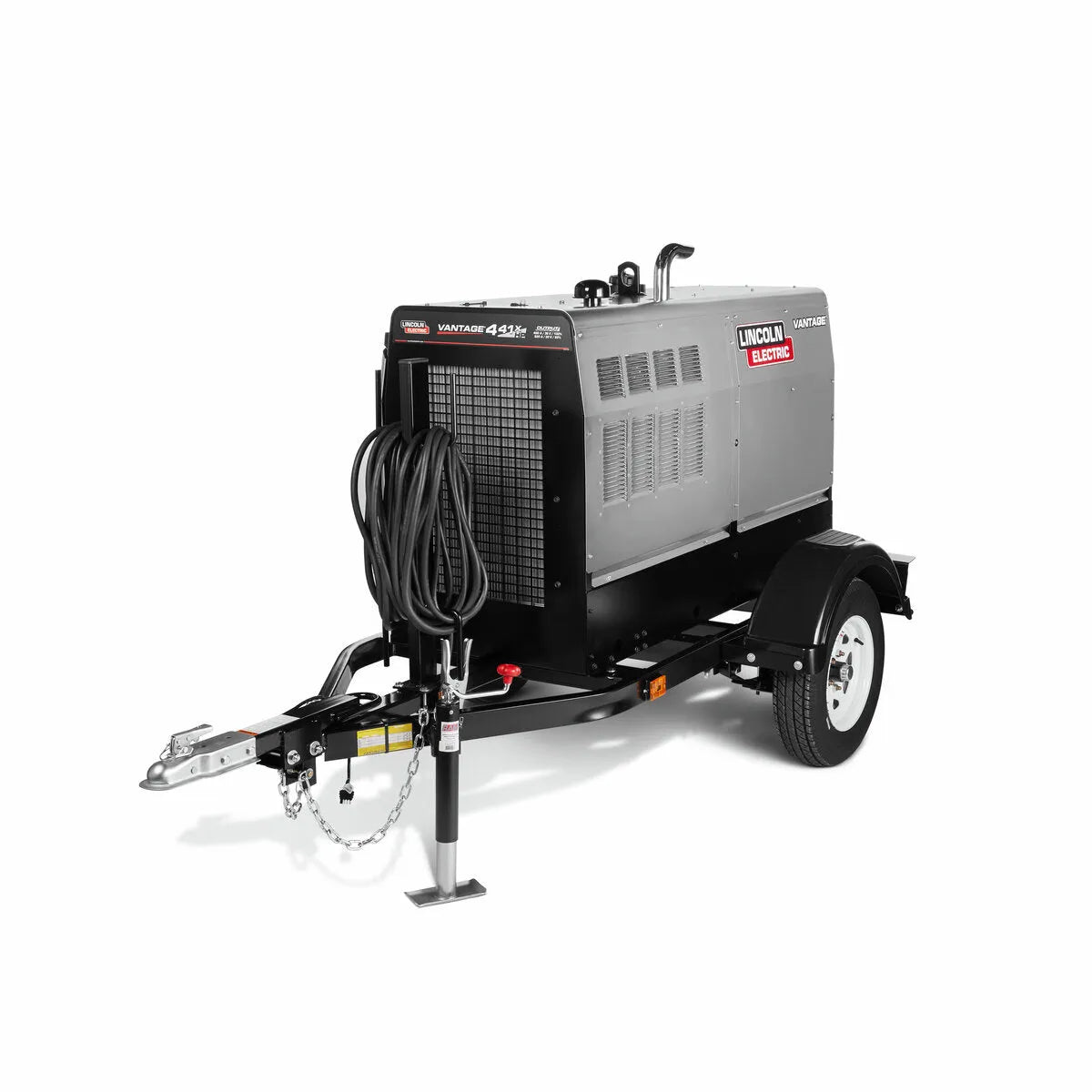 The Lincoln Vantage 441X Engine Driven Welder Perkins - K4535-1 is a mobile welder on a trailer with a large metal body, ventilation grilles, coiled front cables, two wheels, and a tow hitch. The brand and model are labeled on the machine.