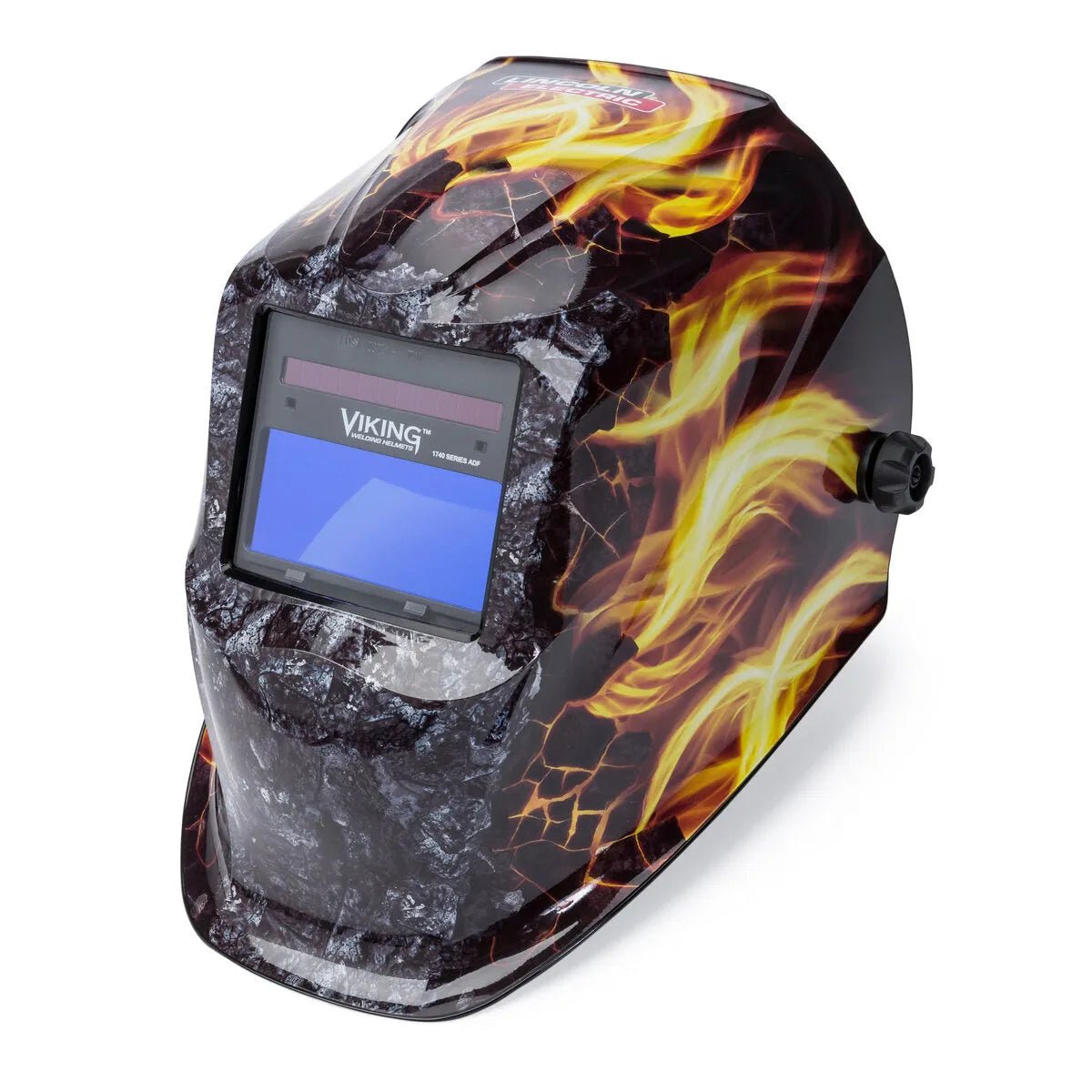 The Lincoln VIKING 1740 Ignition Welding Helmet - K4375-3 features a vivid flame and cracked rock design, 4C Lens Technology with a blue-tinted auto-darkening lens, and a side control knob for safe, stylish welding.