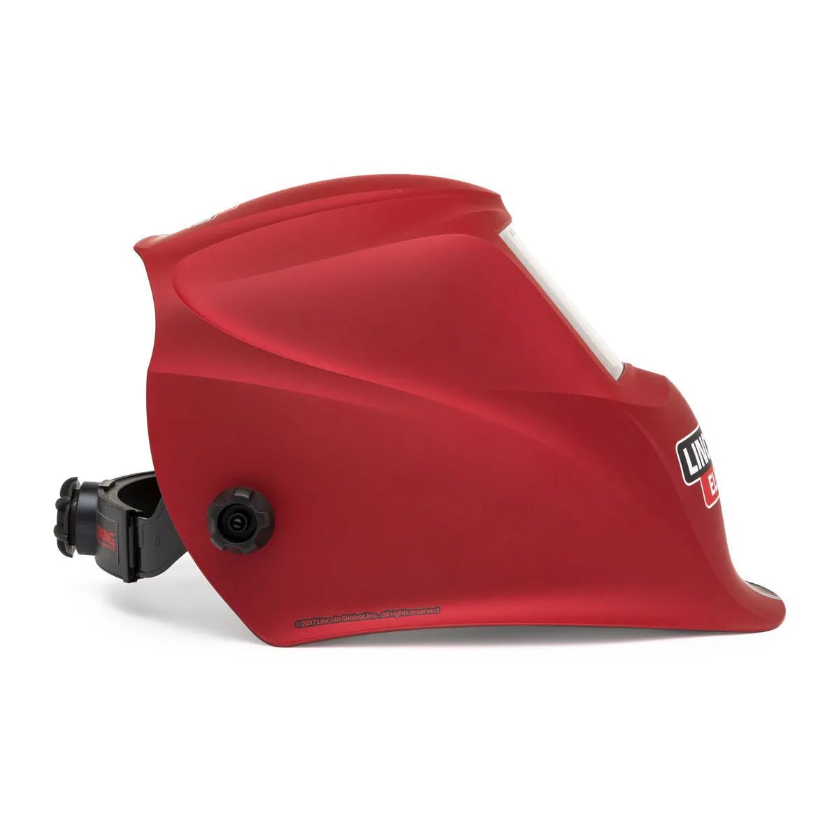 A side view of the Lincoln VIKING 1740 ReCode Welding Helmet K3495-3 shows its red, contoured design with a large auto-darkening face shield, adjustable black headband, and Lincoln Electric logo on the front right.