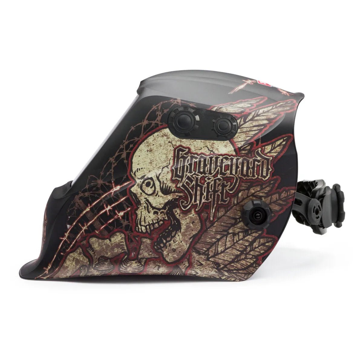 The Lincoln VIKING 2450 ADV Graveyard Shift Welding Helmet (K3099-5) features a bold skull, barbed wire, feathers, Graveyard Shift text, adjustable knobs, head strap attachment, and 4C Lens Technology.