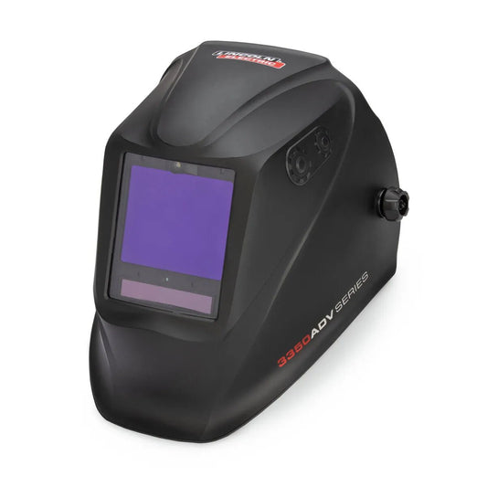The Lincoln VIKING 3350 ADV Black Welding Helmet - K3034-5 features a large auto-darkening lens, adjustable side knobs, and 3350 ADV SERIES in red and white. The angled view shows its curved shape and protective design.
