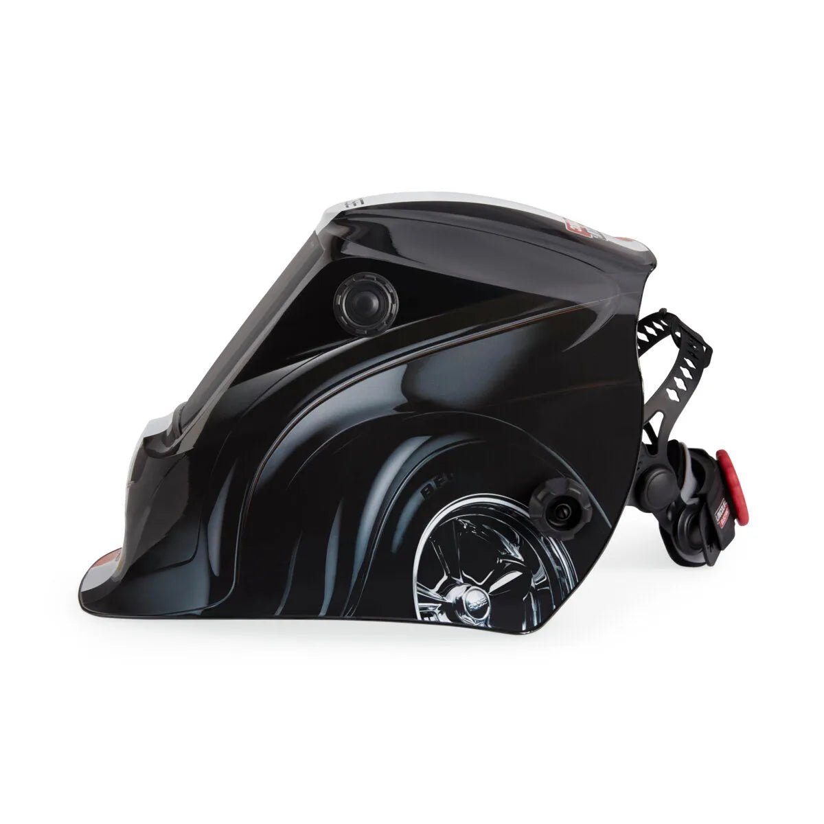 The Lincoln VIKING 3350 Foose Monarch Welding Helmet - K5133-4, shown in left-side profile, features a glossy black finish with a wheel-like side design, auto-darkening lens, large viewing window, adjustable head strap, and side control knobs.