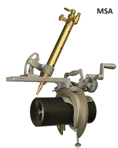 Mathey MSA Saddle Machine 1.5-4in pipe cutter with brass, metal gears, hand crank, and torch for welding, on black pipe.
