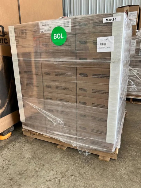 Lincoln ED030613 SureArc S6 .045 MIG Wire pallet (81 rolls), wrapped in plastic for welding tools, WeldingMart shipping label visible.