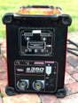 A Lincoln Electric Power Wave S350 Advanced Process Factory Demo Welder (U2823-3) sits outdoors on a brick surface, clearly showing its control panel, connectors, and labels.