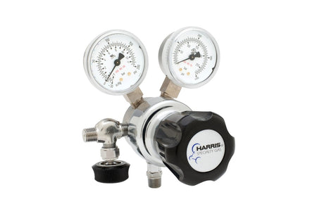 The Harris - 701-125-000-A High Purity Regulator (701125000A) is a single-stage cylinder regulator with dual gauges, metal fittings, and a black HARRIS Specialty Gas knob, shown on a white background for laboratory use.