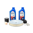 The Lincoln Engine Maintenance Kit for Eagle 10,000 GV750 Welder (K5380-1) includes two blue Mobil Special 10W-30 oil bottles, air filter, oil filter, fuel filter, spark plug, and a black serpentine belt—perfect for engine upkeep.