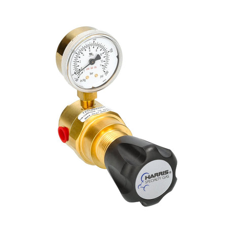 The Harris Ultra High Purity Brass Barstock Regulator (Model 723-125-000-D-1) features a black adjusting knob, pressure gauge with psi and kPa readings, and is designed for precise specialty gas control.