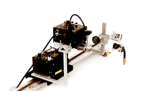 Bug-O DC SPEED WEAVING KIT 120VAC (BUG-1916) welding carriage with control units, rail, cables, and clamps for precise welding.