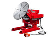 Lincoln 6,000 lb. Welding Positioner AD1043-121 with rotating table, control buttons & foot pedal, shown on white background.