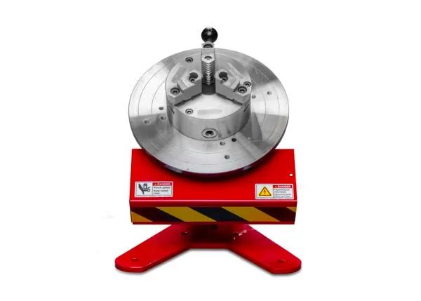 Lincoln 150 lb Table Top Welding Positioner AD1043-84 on sturdy red stand, compact welding tool for accurate metalwork tasks.