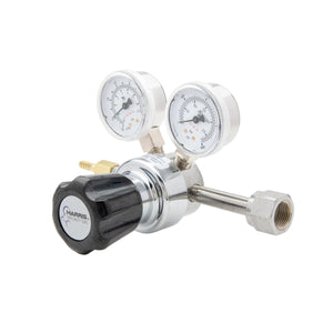 Harris 401C-050-320-A CO2 Regulator for welding, single-stage, dual gauges, brass/steel connectors on white background.