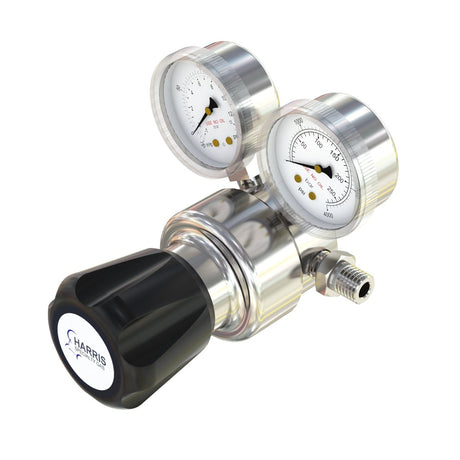 Pressure regulator with two gauges on a white background