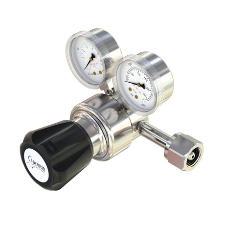 Metallic pressure regulator with two gauges on a white background