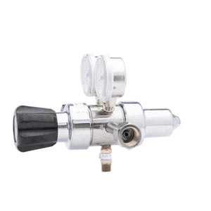 The Harris HP702-050-320-BE Carbon Dioxide Regulator (702050320BE) features a silver body, two round pressure gauges, a black left-side adjustment knob, and multiple valve connectors, shown isolated on a white background.