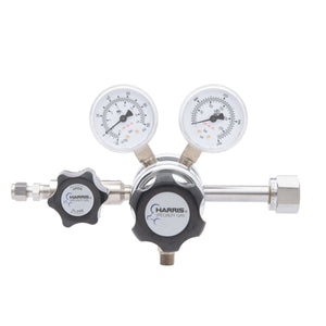 The Harris HP702-050-320-BE Carbon Dioxide Regulator is a dual-gauge, two-stage cylinder regulator featuring two round pressure dials, a control knob marked open/close, and metallic connectors.